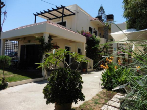 Гостиница Julies Apartments  Vathianos Kampos